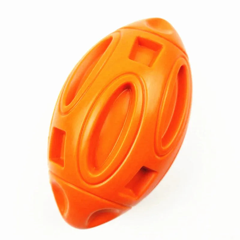 Blue, green, and orange natural rubber squeaky dog ball with textured surface grooves for aggressive chewers.