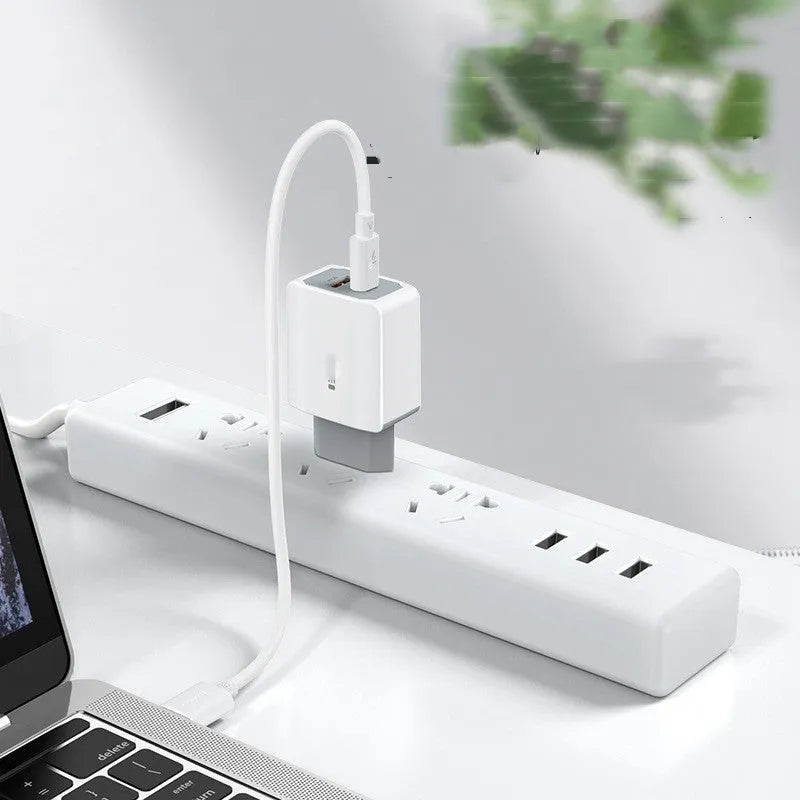 White phone fast charger set with USB cable and compact charging head