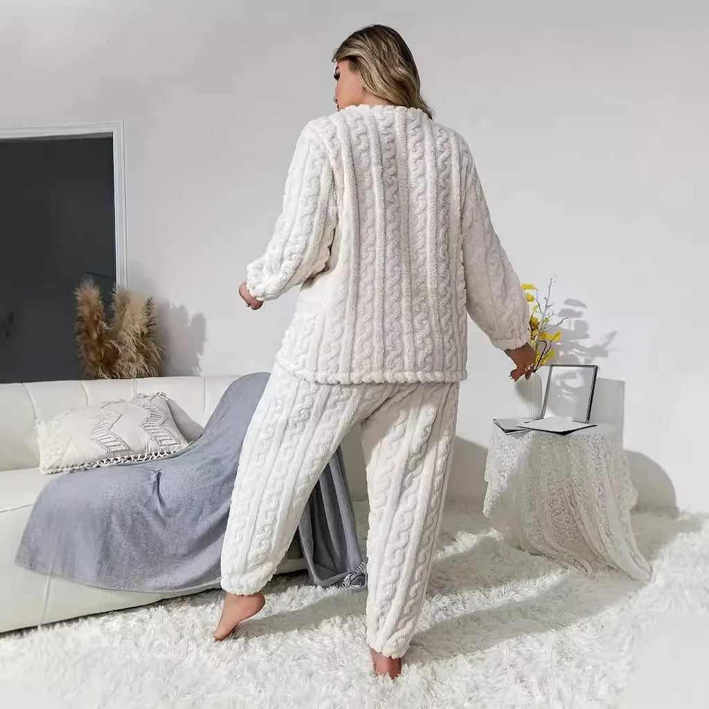 Women's creamy white plush crew neck two-piece lounge set with long sleeves and full-length trousers.