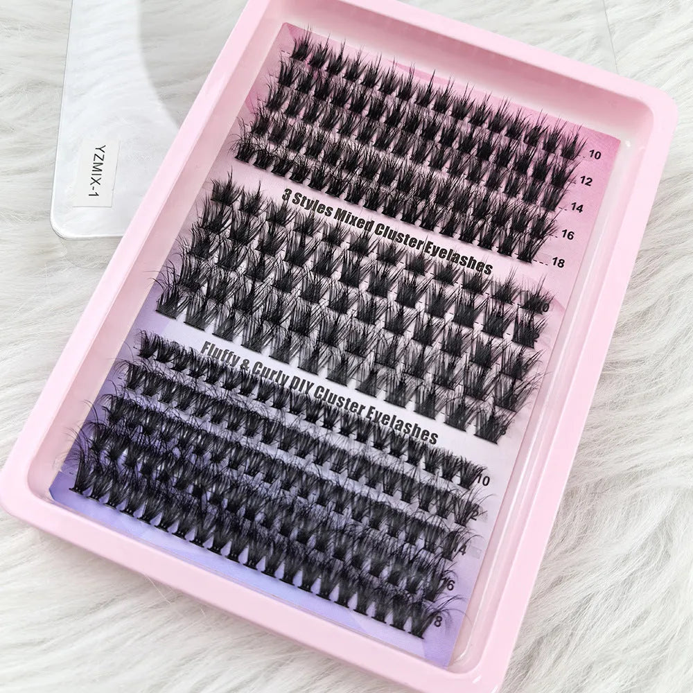 Box of messy mixed false eyelashes showing varied lash densities and high imitation material texture.