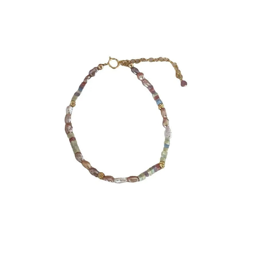 Purple and silver natural pearl bracelet and necklace set with 14K gold plating in U-shaped arrangement