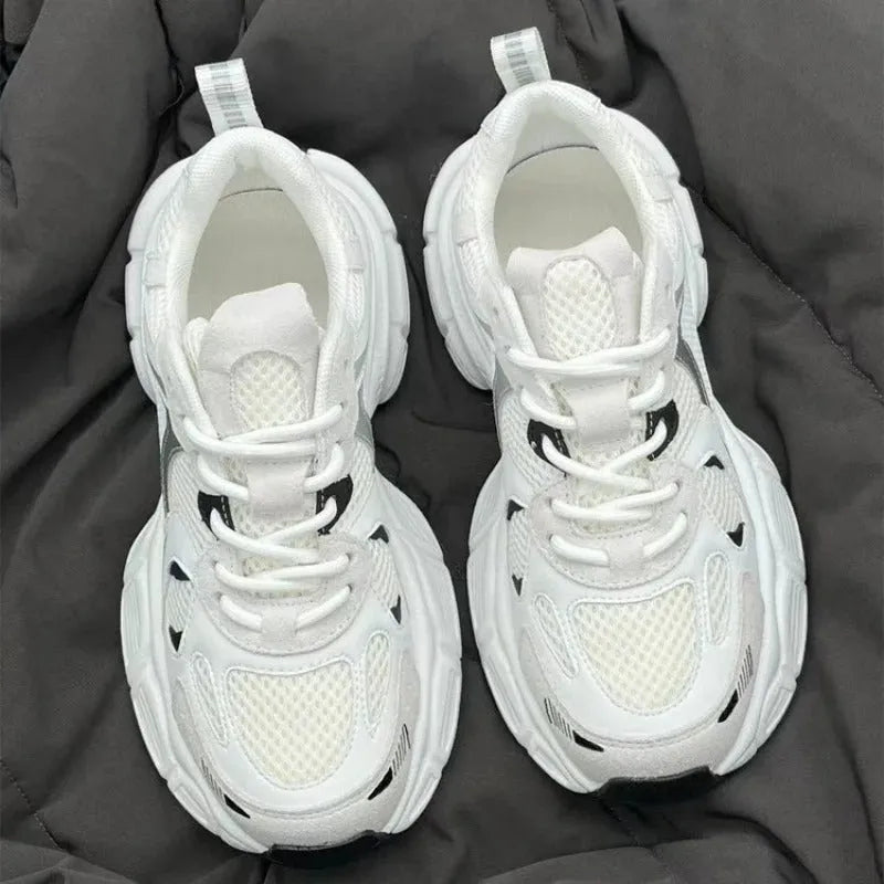 Beige mesh platform sports shoes with wedge heel and lace-up front on white background