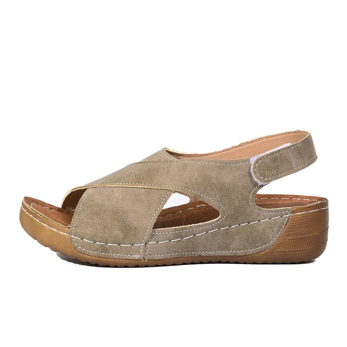 Brown Roman platform sandals with open toe and Velcro strap on a white background.