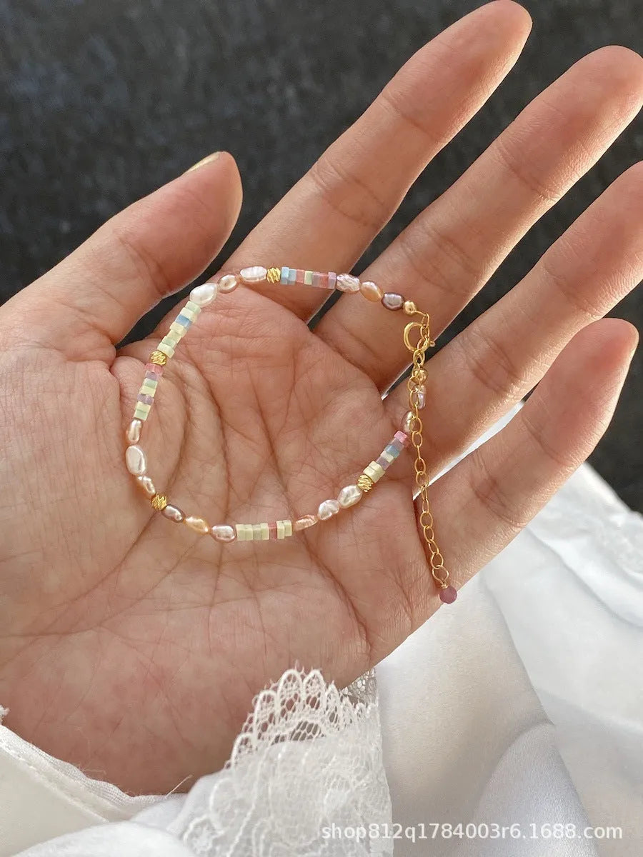 Purple and silver natural pearl bracelet and necklace set with 14K gold plating in U-shaped arrangement
