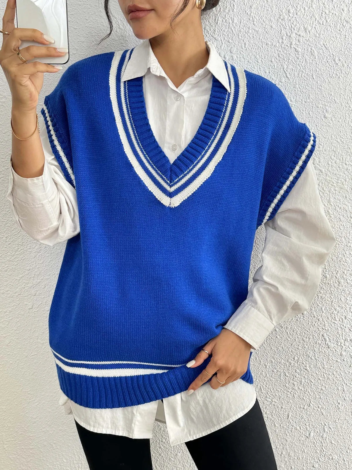 Women's college style wool vest sweater in loose-fitting free size available in blue, coffee and black colours