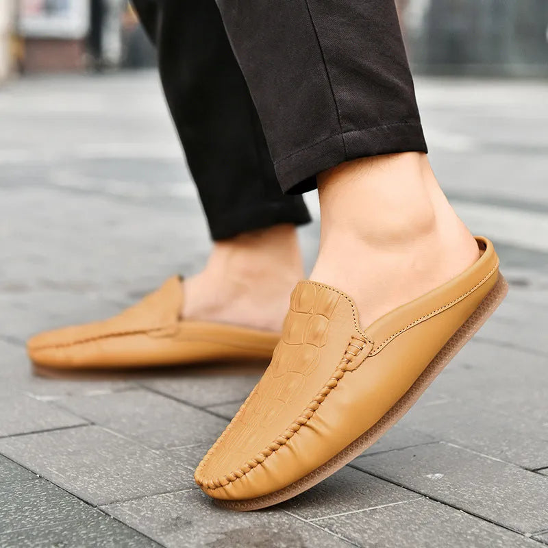 Men's black breathable semi-slippers with an artificial PU upper and rubber sole on a white background.