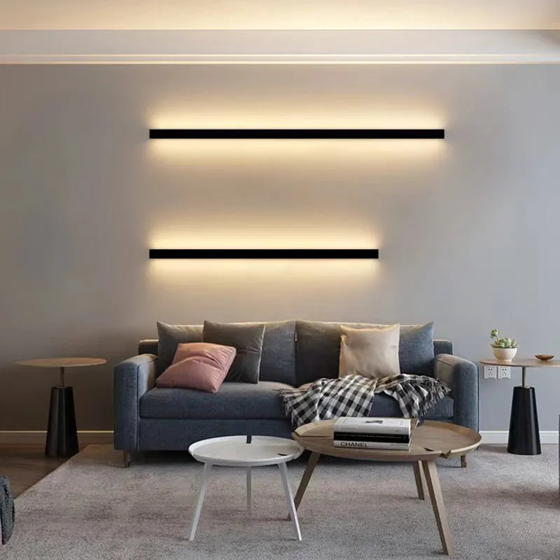 80cm long black simple strip LED wall lamp with touch control for three light colours on a wall.