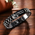 Men's stainless steel bracelet with curved heart piece featuring black electroplated lettering