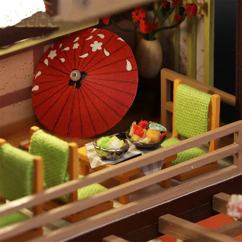 Japanese style sushi restaurant wooden building model kit with flash function, assembled on a shelf