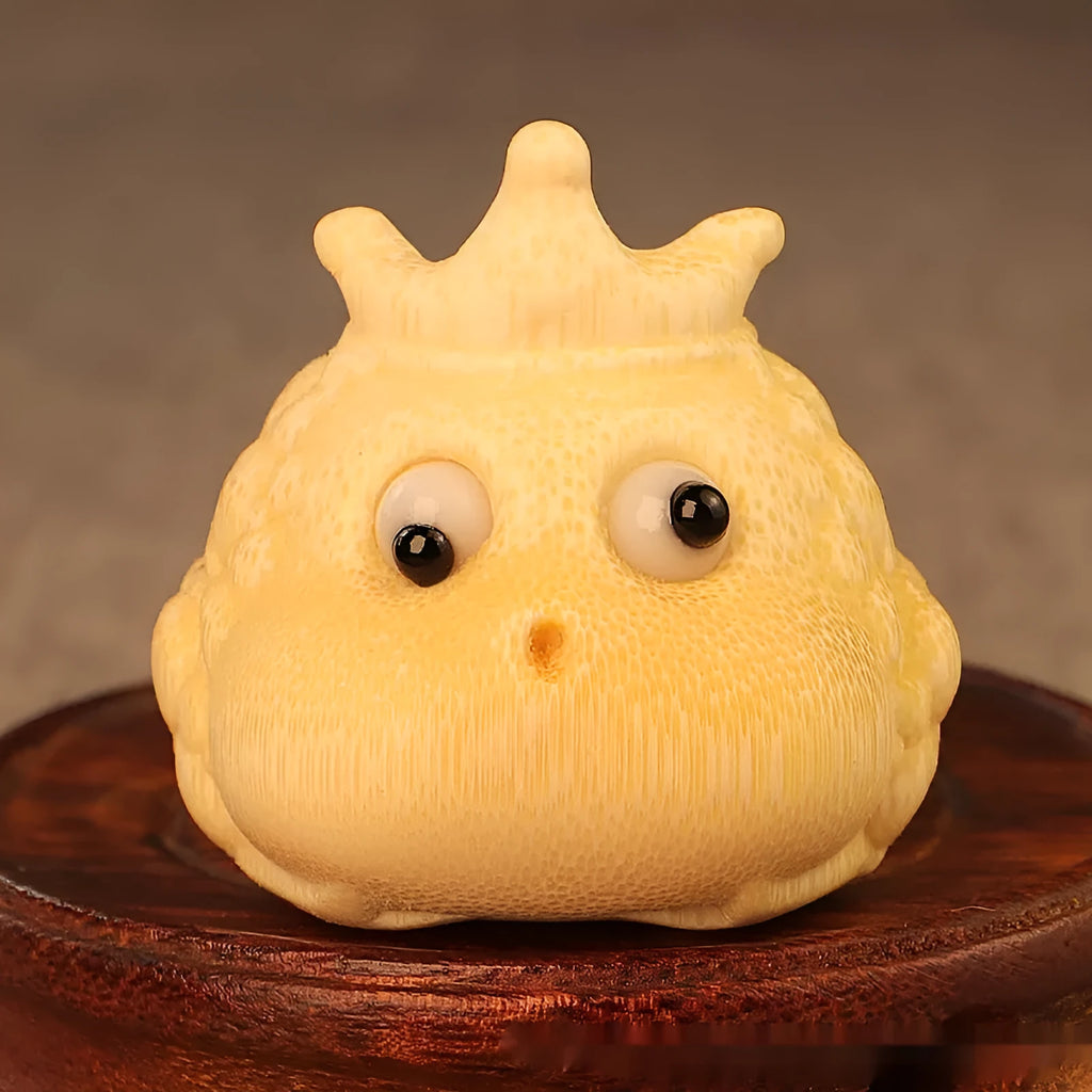 Solid bamboo carving of a Crown Princess Toad ornament with live eyes, 5.0cm.