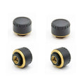 Four black Bluetooth tyre pressure monitors for smartphone connection with IP67 waterproof rating