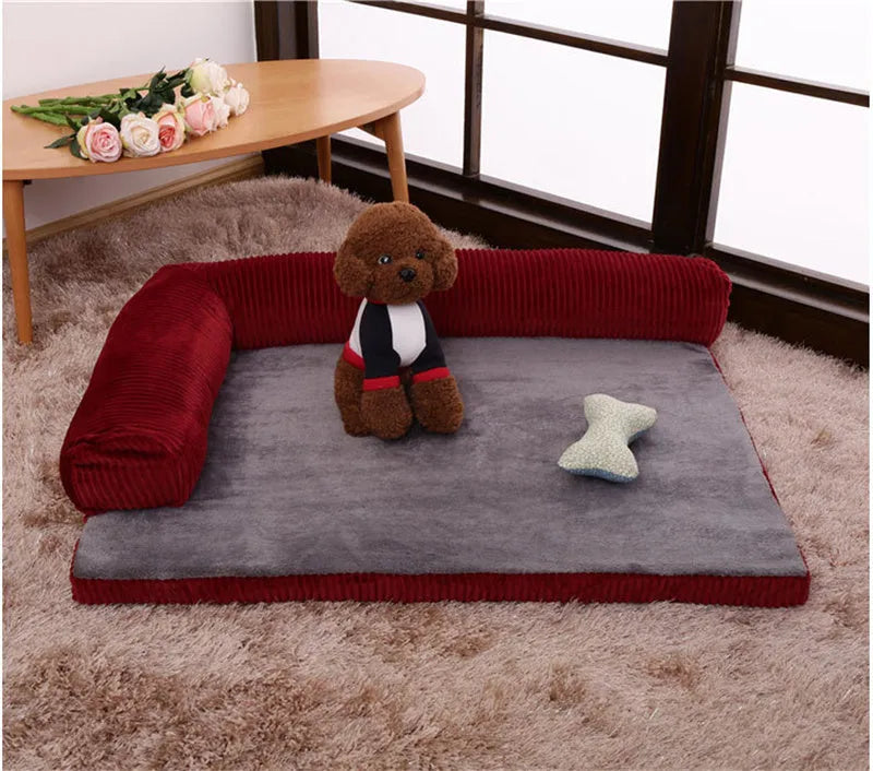 Corduroy pet sofa dog bed in grey, showing removable cover and non-slip base, placed on a hardwood floor.