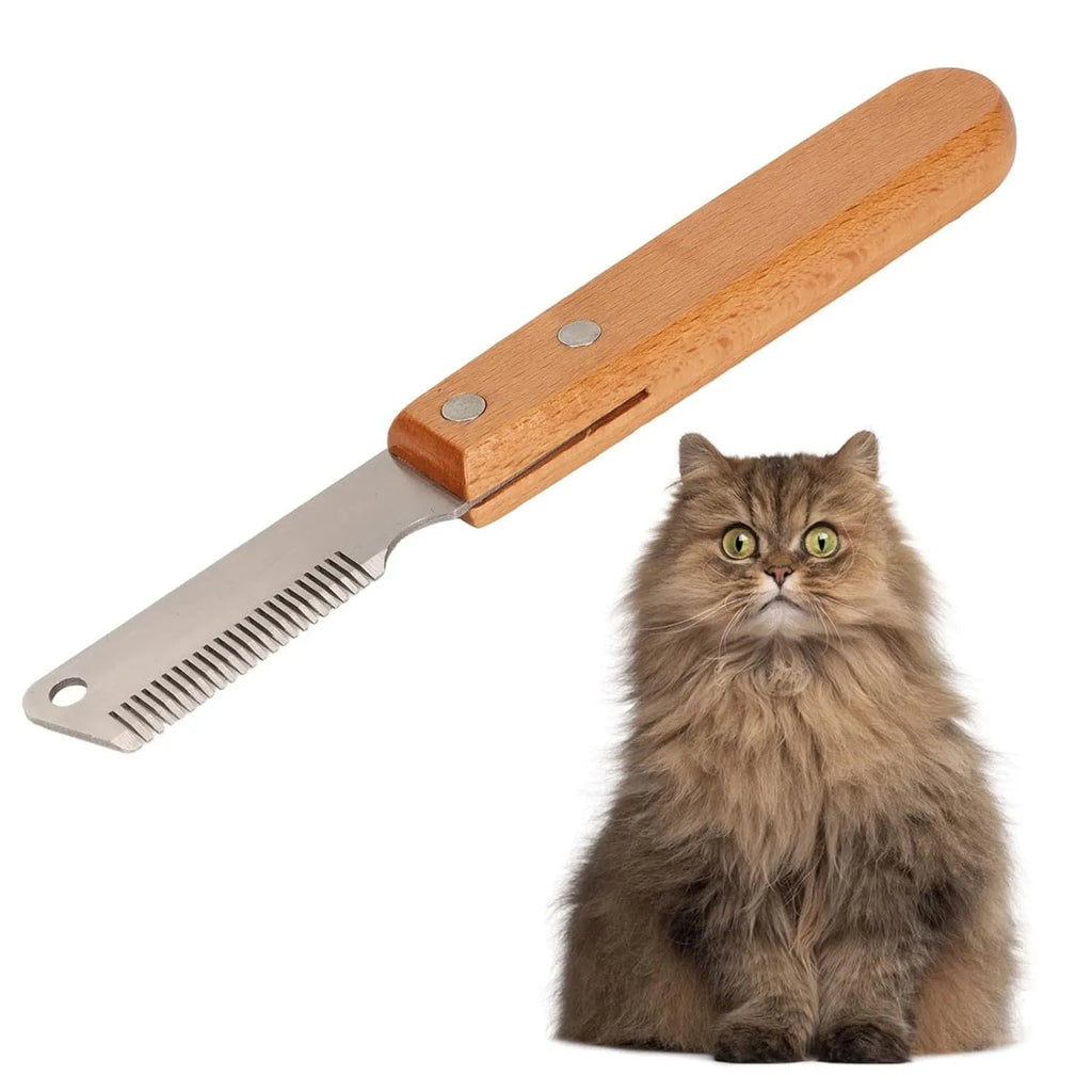 Wooden handled pet stripping comb grooming tool for dogs and cats on a table.
