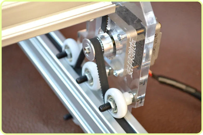 Miniature 3000mw laser engraving machine with a 400mm by 300mm base plate.