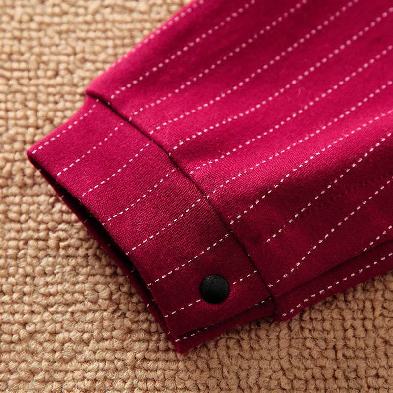 Wine red cotton baby boy romper suit with long sleeves for autumn wear.