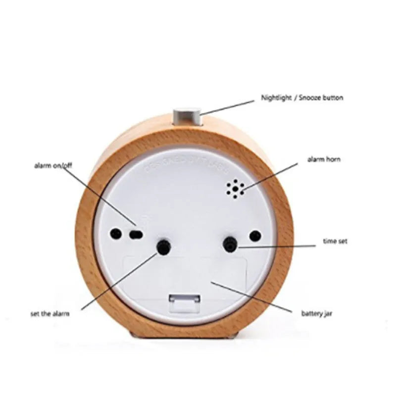 Solid beech wood silent snooze alarm clock showing wooden case and clear dial.