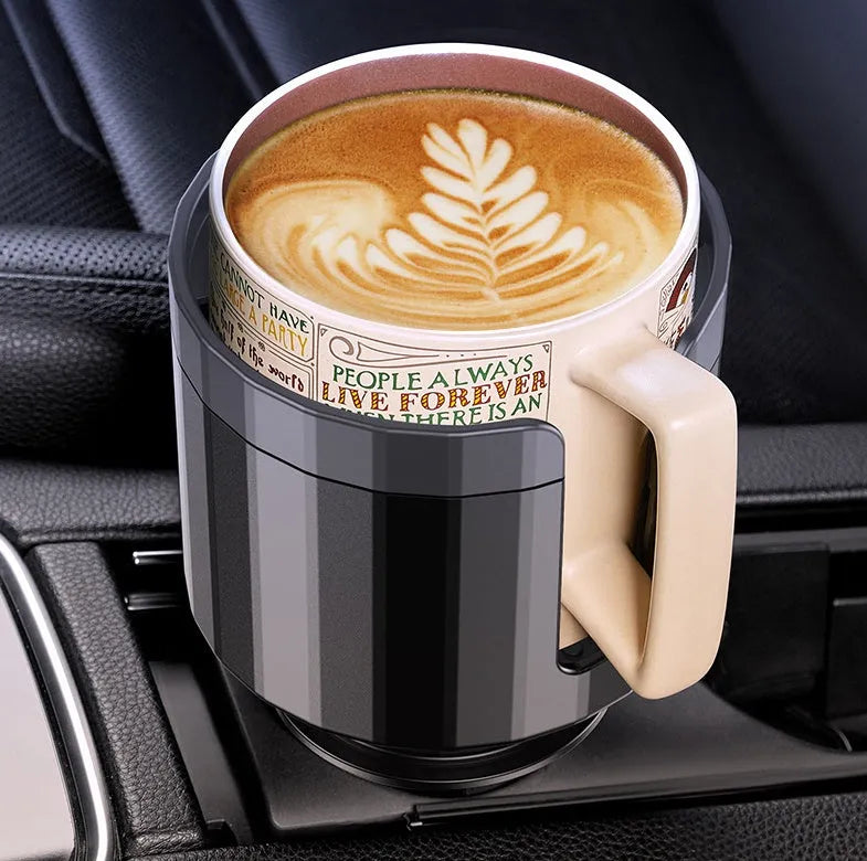 Matte black car cup holder expander with adjustable base for large bottles.