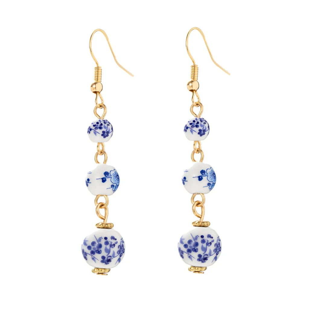 Blue and white porcelain ceramic bead retro earrings with geometric alloy components