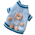 Navy blue wool dog sweater with light blue striped cuffs, metal D-ring on back, soft knitted fabric, for small breeds like Chihuahuas