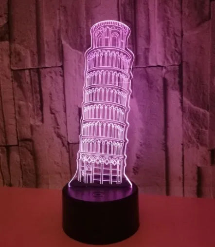 3D Leaning Tower of Pisa acrylic night light on black ABS base, displaying blue LED illumination.