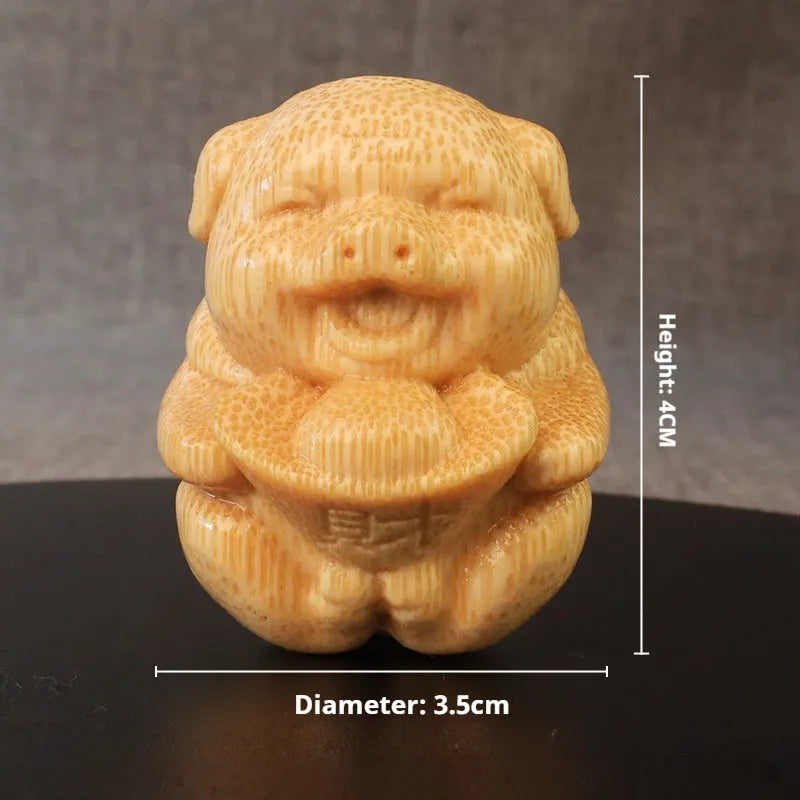 Solid bamboo Fulu pig carving ornament measuring 4cm tall with 3.5cm diameter