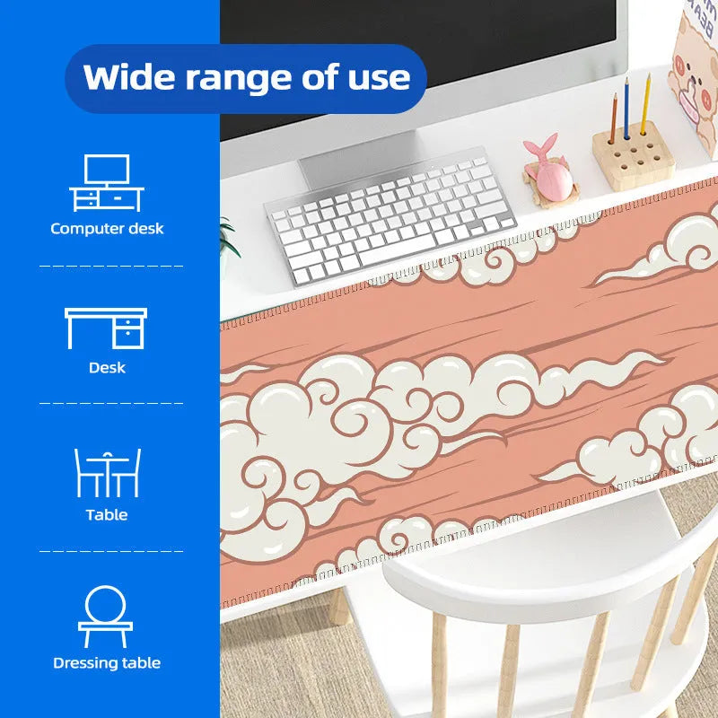 Large natural rubber cloud mouse pad and desk mat with non-slip base on wooden desk