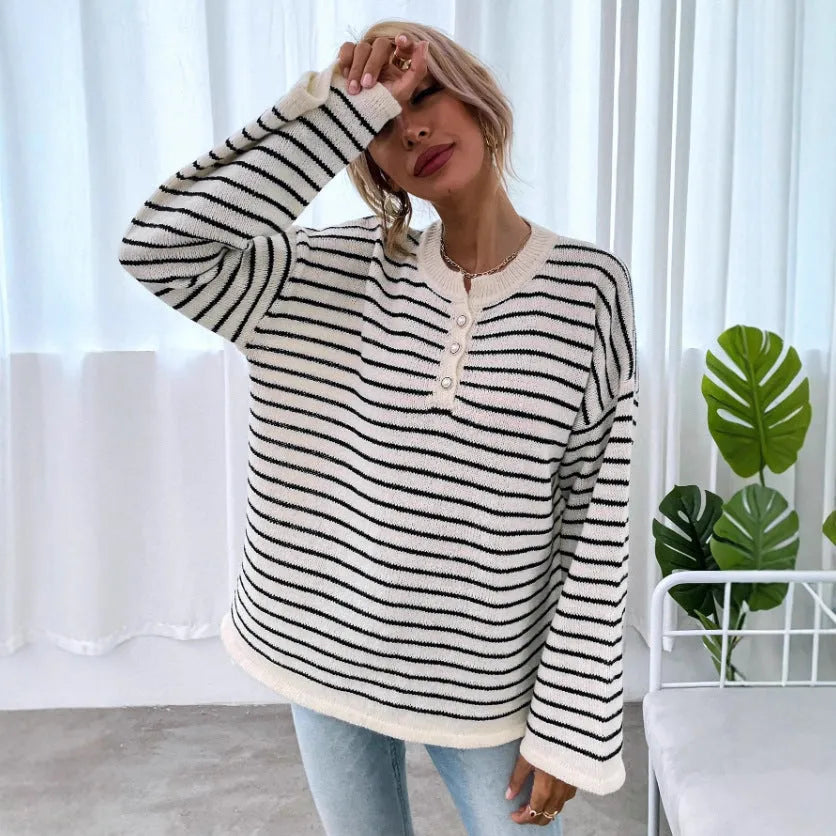 Black and white striped women's casual top with drop-shoulder sleeves and loose fit
