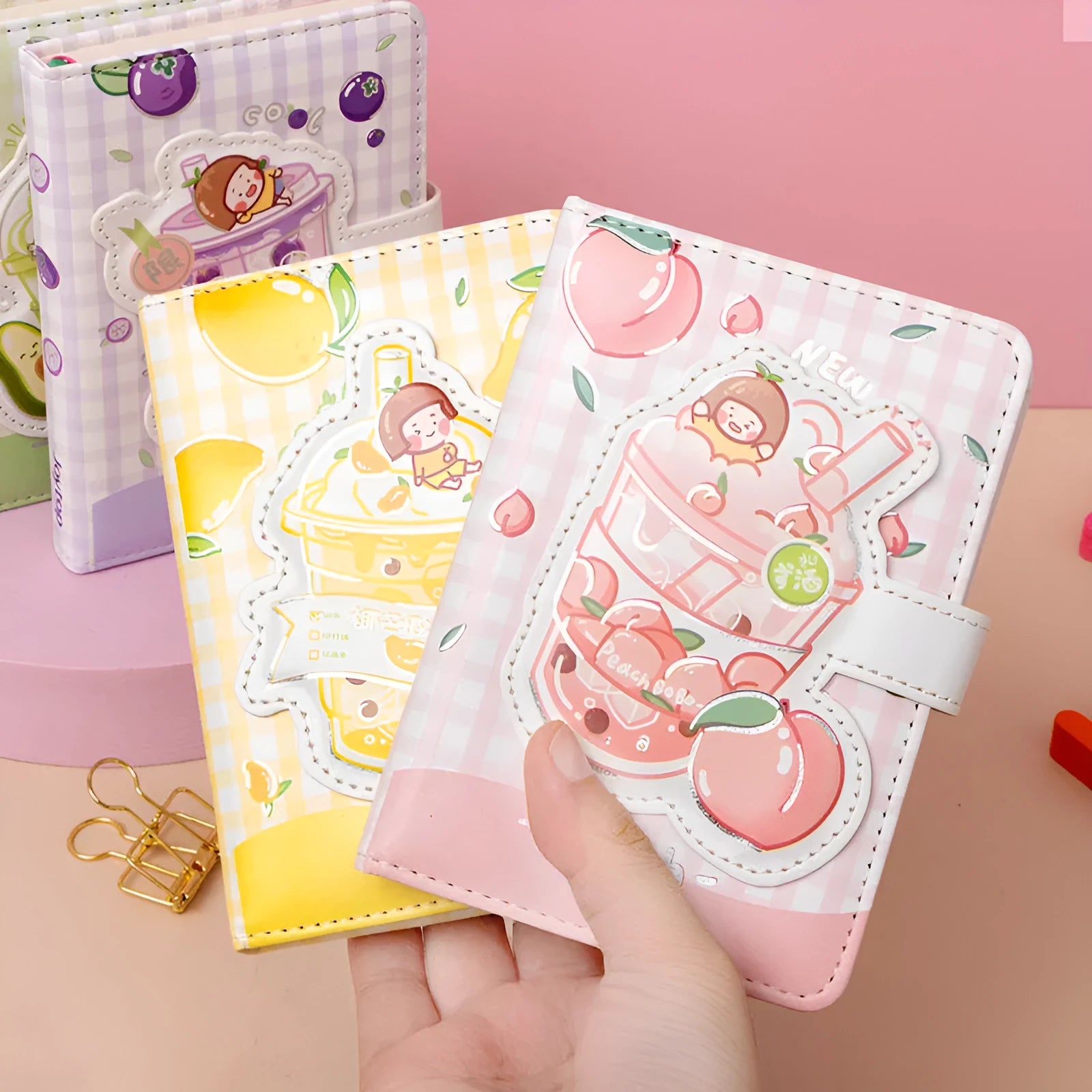 Cute magnetic buckle notebook with heart design in pink, yellow, green, and purple colours