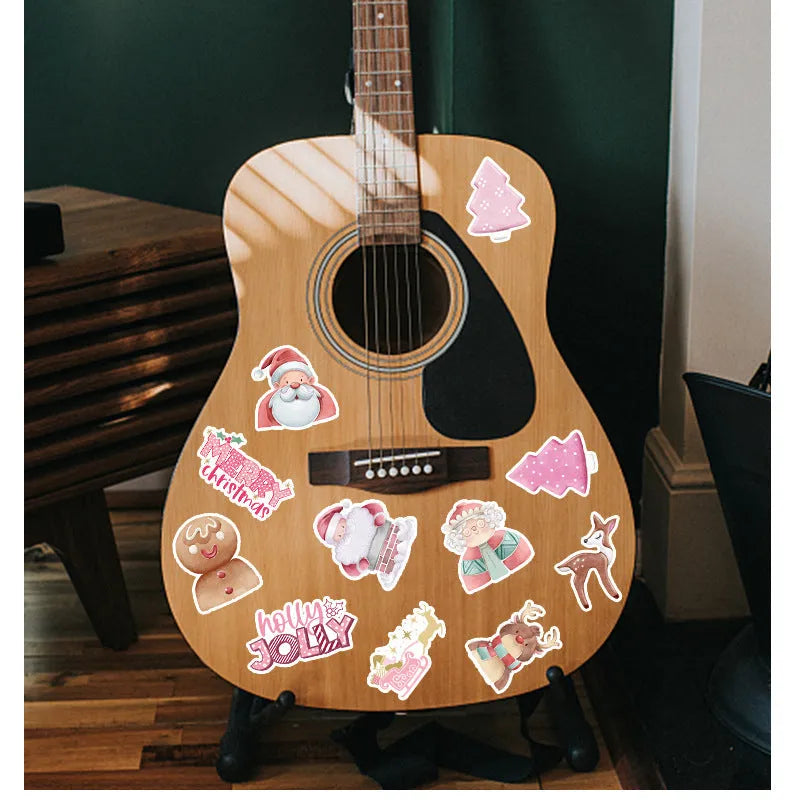 Assortment of 50 cute Christmas themed waterproof stickers ranging from 4cm to 8cm in size on a sheet.