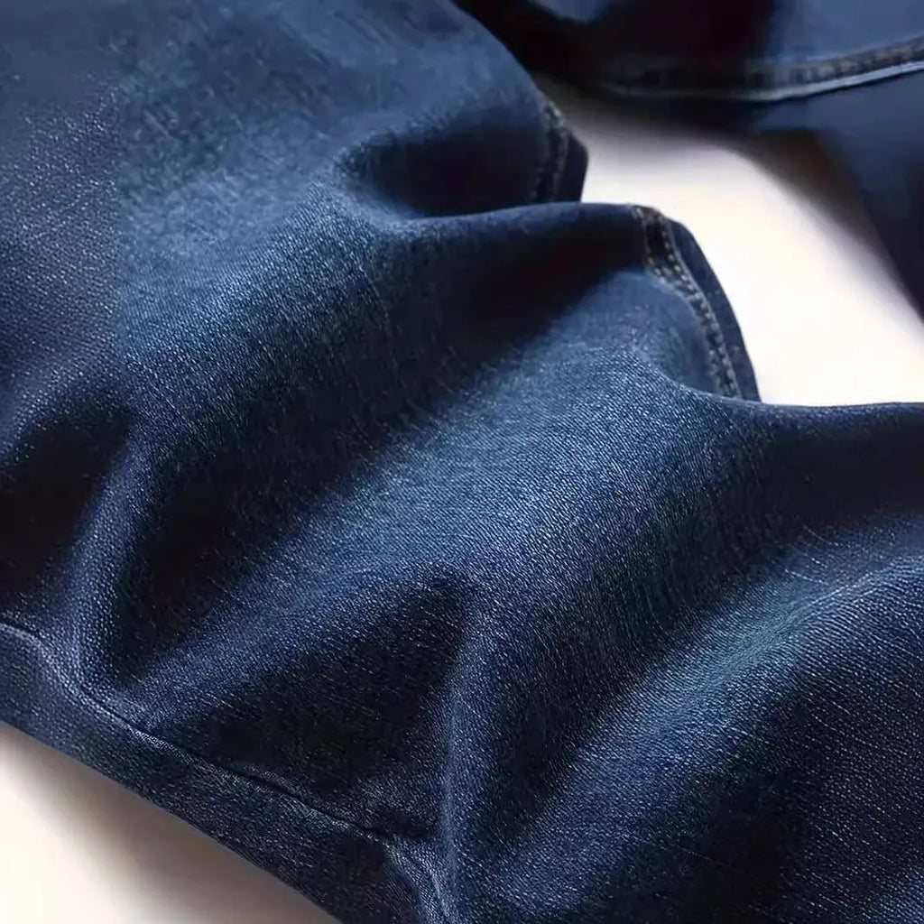 Men's dark blue slim fit jeans with skinny leg design and street fashion style