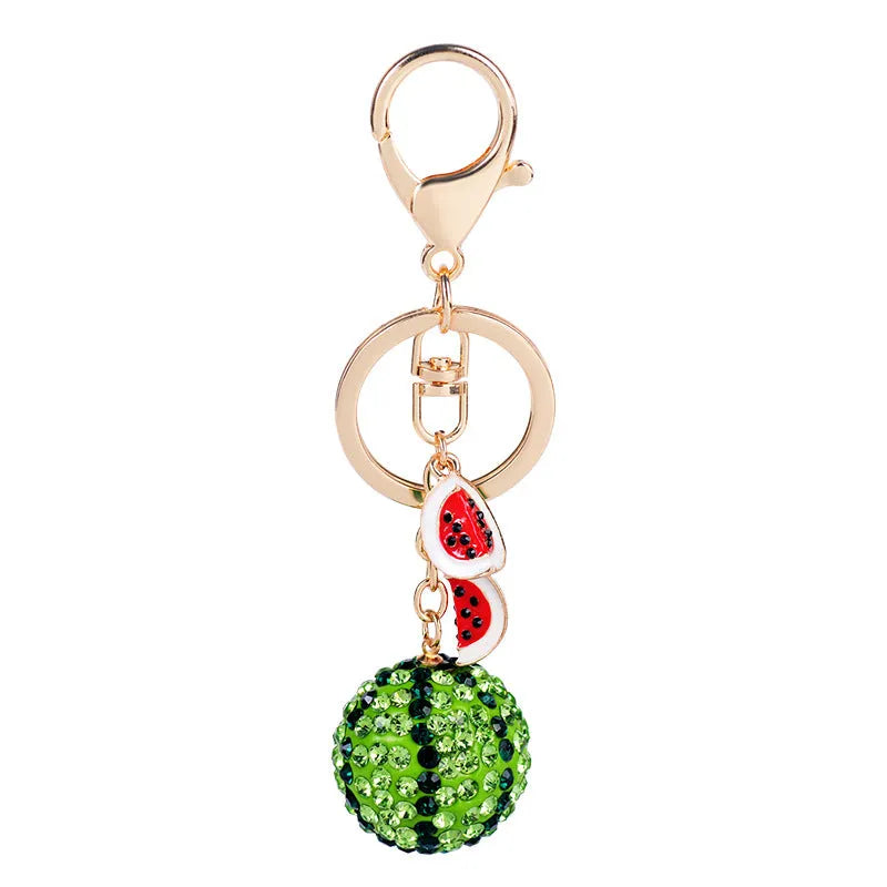 Green zinc alloy watermelon keychain shown at 12cm length.