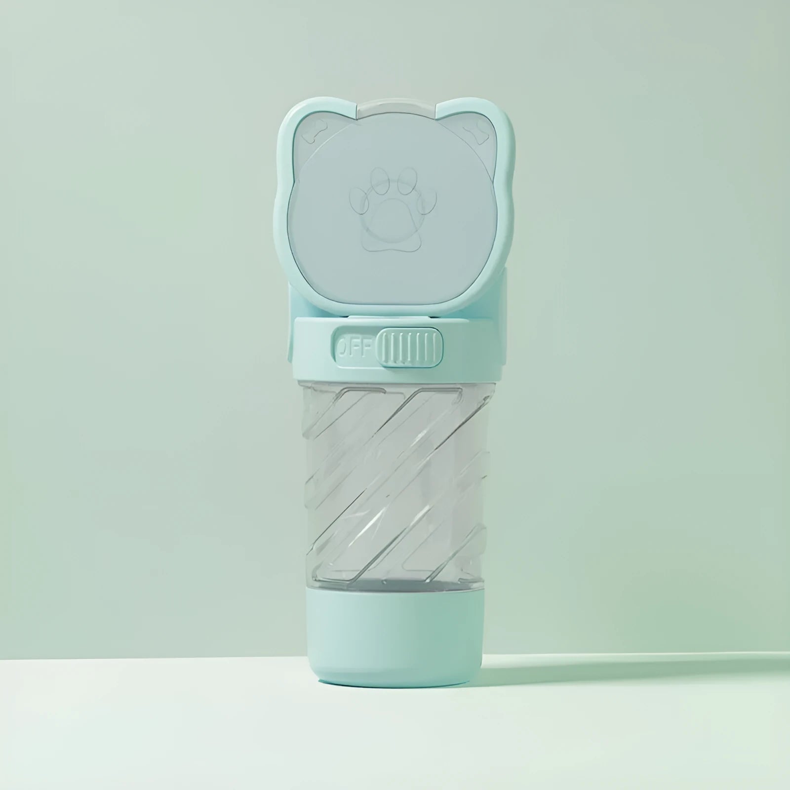 Green 3-in-1 portable pet water bottle with water dispenser, food container, and garbage bag compartment