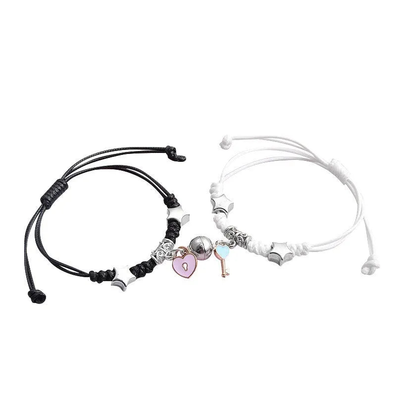 A pair of matching magnetic suction bracelets with an alloy electroplated finish, showing a sample design.