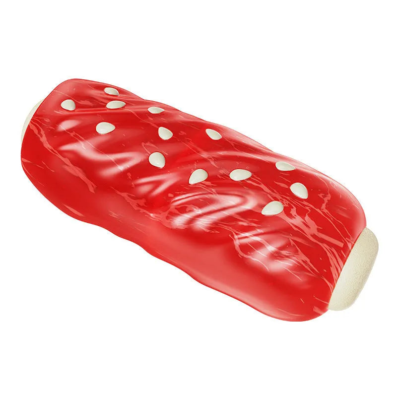 A primary-colour plastic molar rod dog chew toy with textured surfaces and a treat cavity.