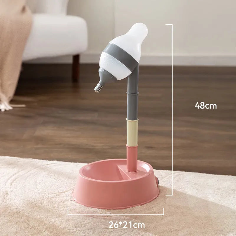 Green adjustable height pet water dispenser with detachable bowl and ball-tip nozzle on a kitchen floor.