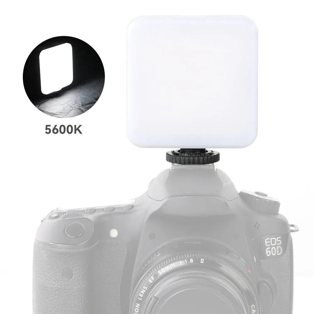 Square pocket-sized camera flash tripod light with rotatable head showing compact dimensions