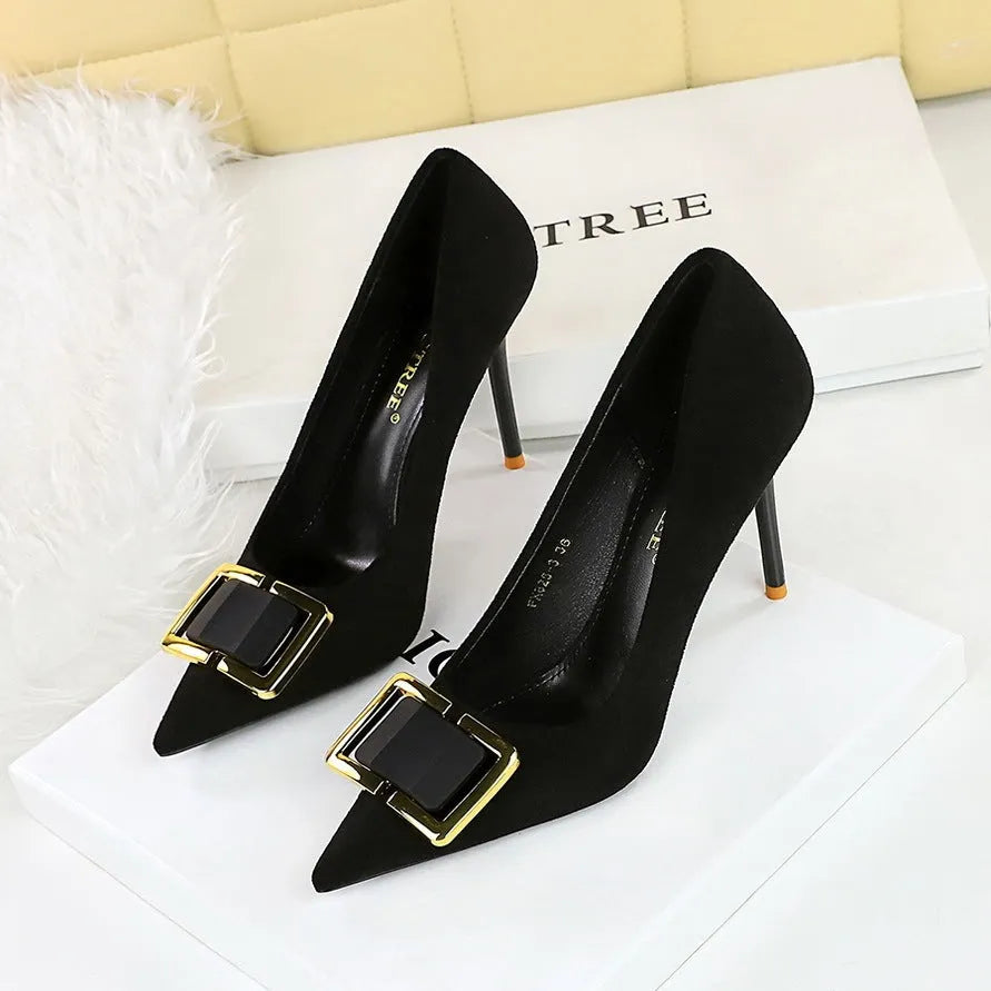 Black suede women's stiletto high heels with a pointed toe and a 9cm heel.