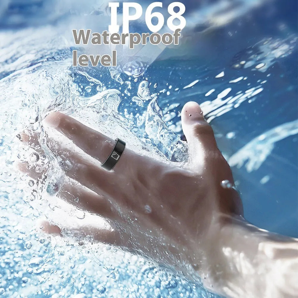Black ceramic smart ring for health monitoring on a finger, showing heart rate and blood oxygen tracking.