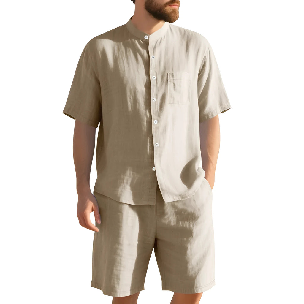 Men's light blue linen blend summer suit with Henry collar shirt-style jacket and matching shorts on a hanger.