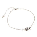 Women's gold or silver tone alloy bracelet with a pineapple charm.