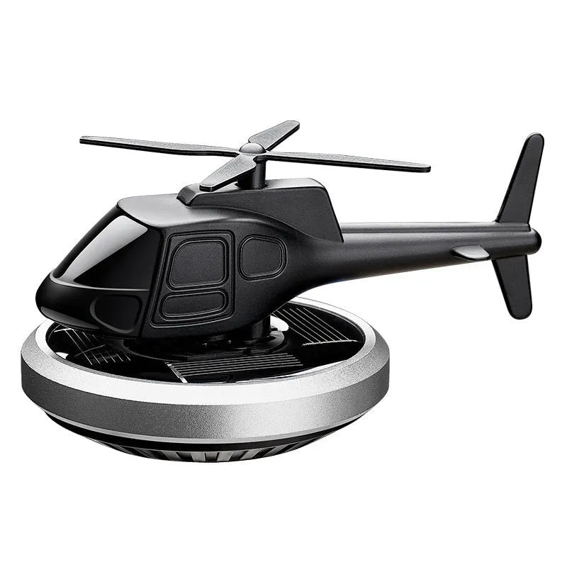 Metal solar helicopter car air freshener with rotating blades in silver, black, or blue colours