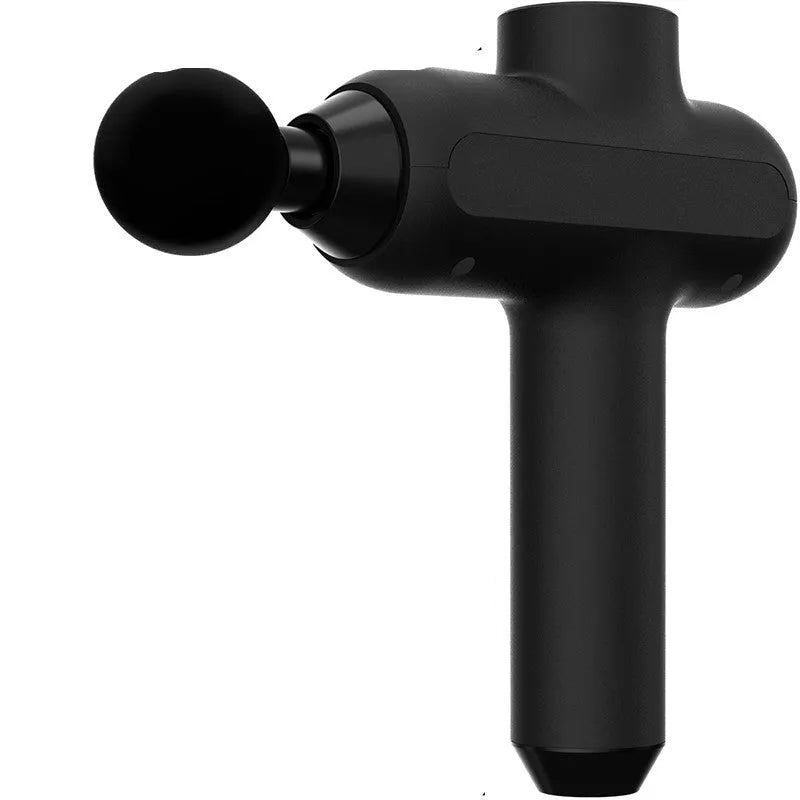 Black electric percussion muscle massager with six different coloured attachment heads on a table.