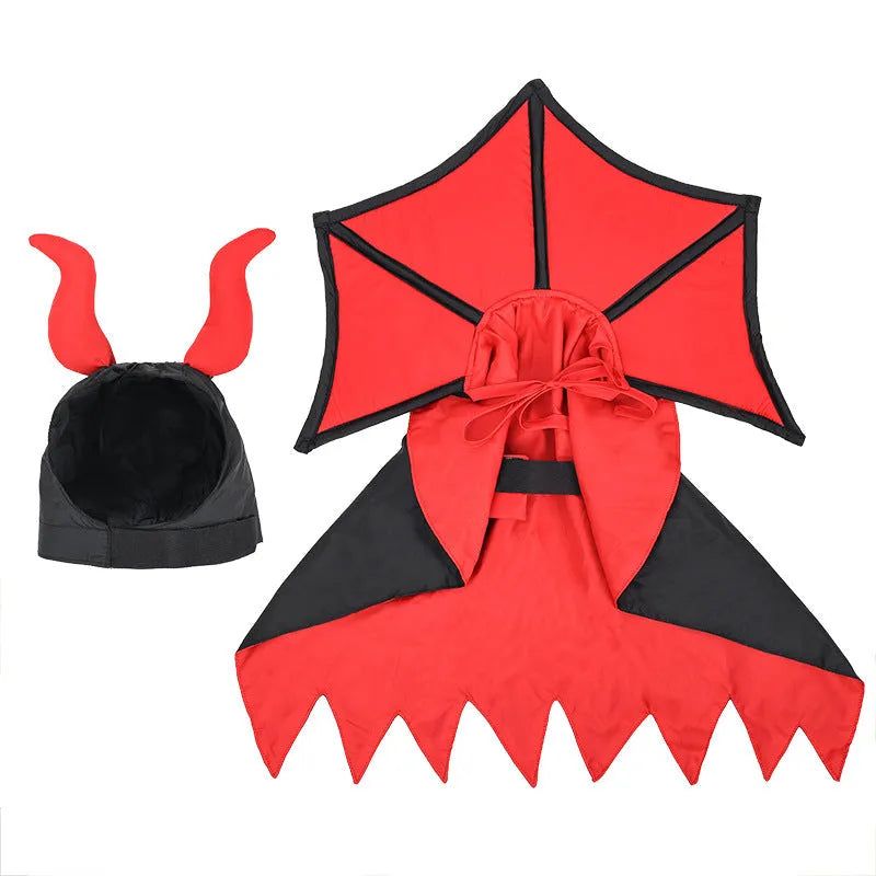 Black polyester vampire cloak and hat costume on a small dog or cat for Halloween.