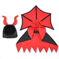 Black polyester vampire cloak and hat costume on a small dog or cat for Halloween.