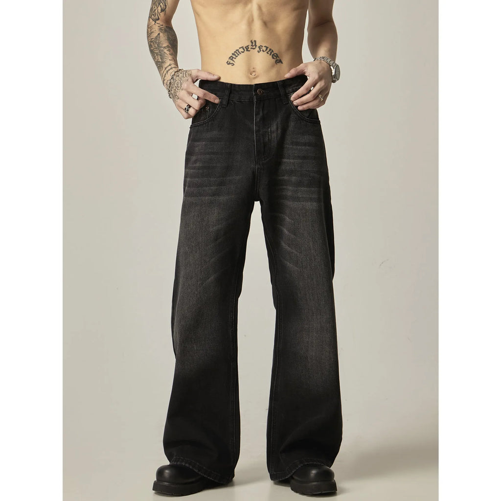 Black loose straight-leg retro jeans with zip fly opening on mannequin