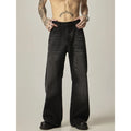 Black loose straight-leg retro jeans with zip fly opening on mannequin