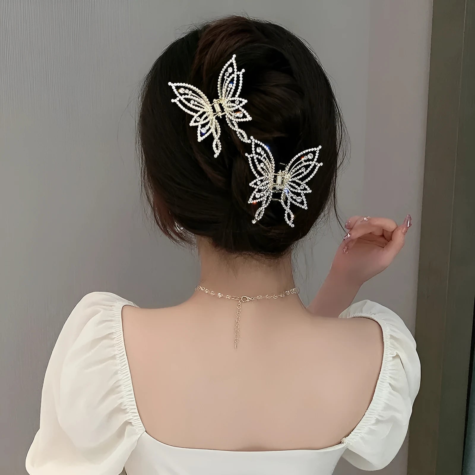 Butterfly hair barrette with alloy metal construction and electroplated finish