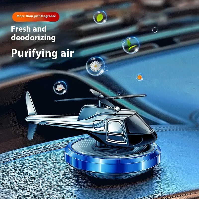 Metal solar helicopter car air freshener with rotating blades in silver, black, or blue colours