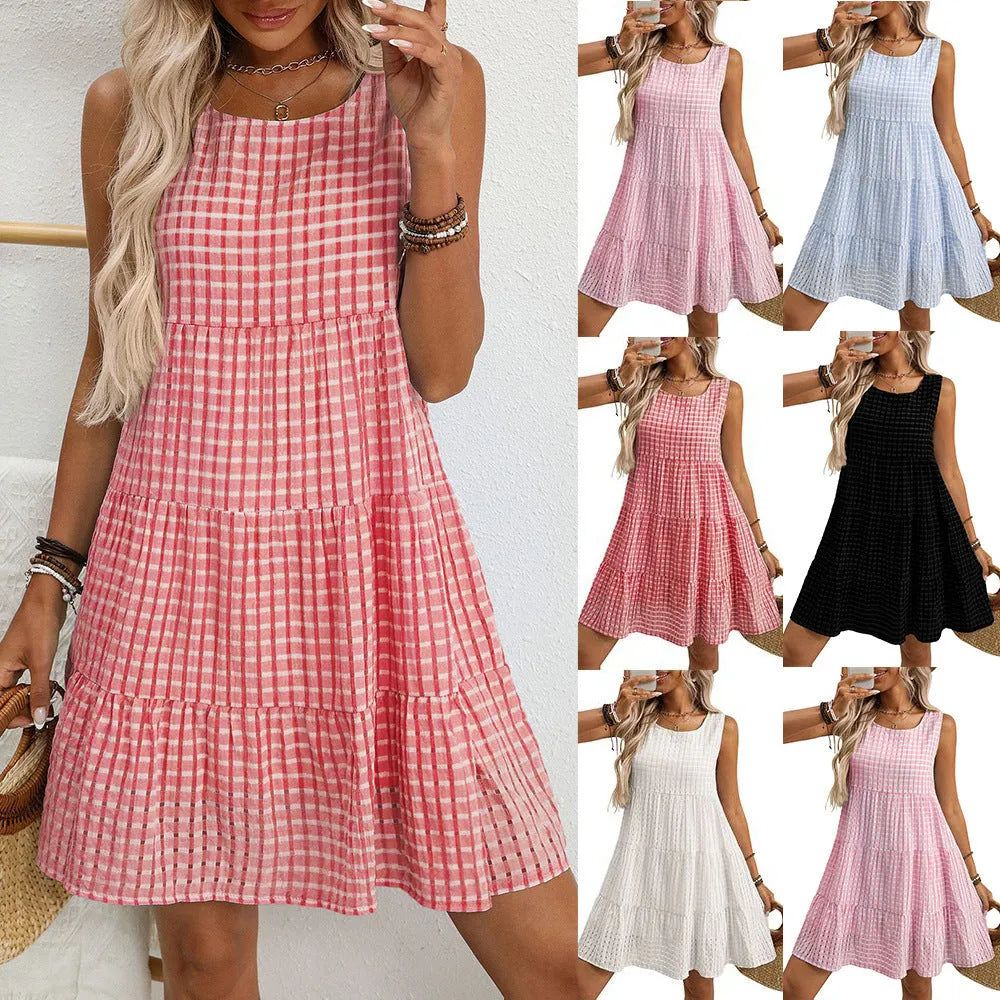 Women's sleeveless plaid dress with an oversized swing skirt in light blue, shown on a mannequin.