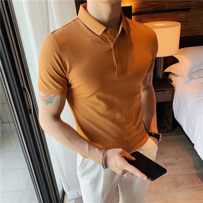 Man's solid colour cotton blend polo shirt with lapel collar and short sleeves in Korean style fit.
